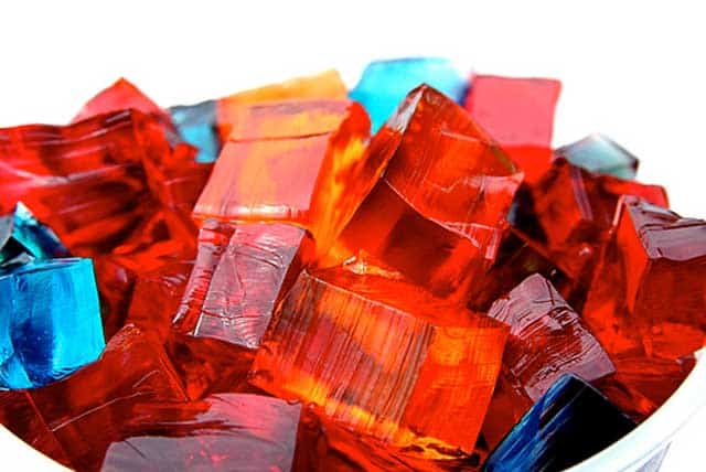 Cubes of jello in different colors in a bowl. | MakeSauerkraut.com