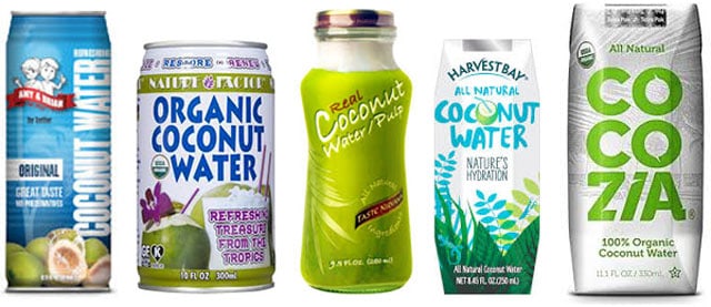 Five bottles of different brands of coconut water. | MakeSauerkraut.com