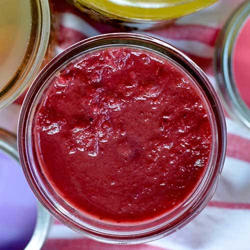 Top view of an opened jar of Cranberry Orange relish. | MakeSauerkraut.com