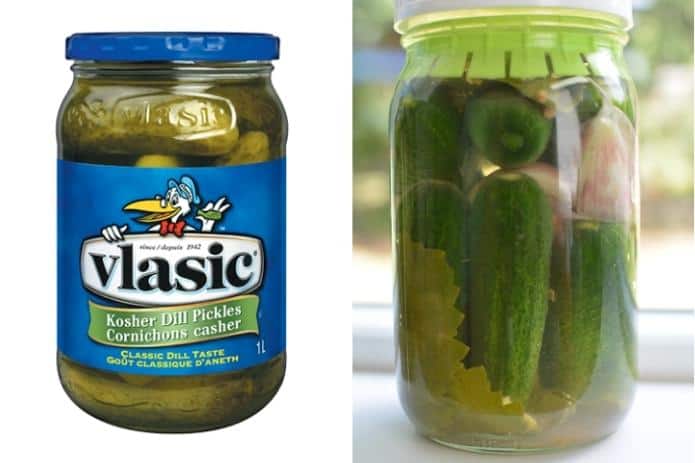 A jar of store-bought pickles next to a jar of homemade pickles. | MakesSauerkraut.com