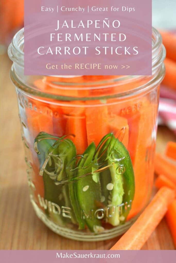 Fermented carrot sticks with Jalapeno in a mason jar