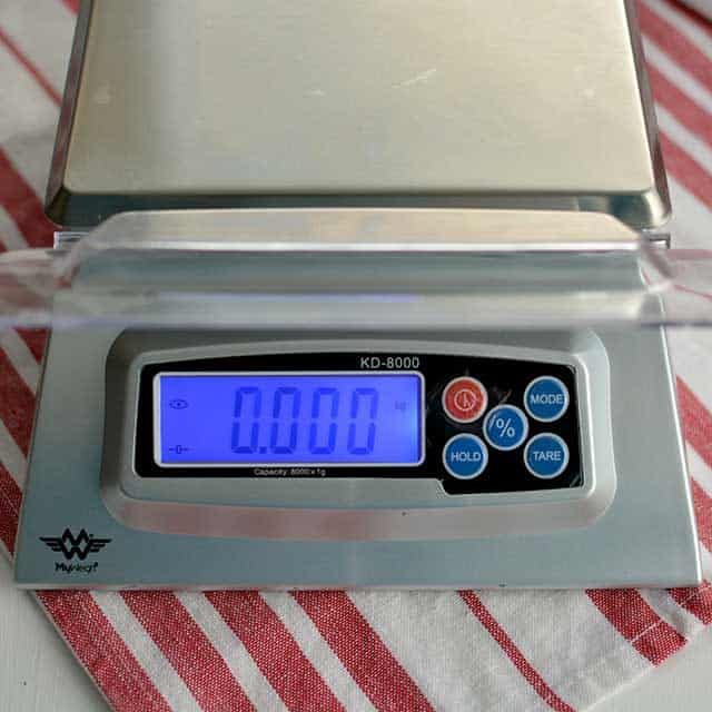 Front view of the MyWeigh KD8000  Digital Scale with the monitor showing "0000". | MakeSauerkraut.com