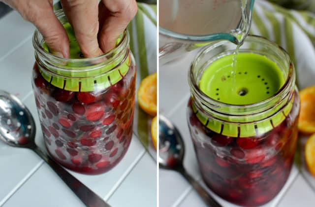Two images of glass jar filled with pickled cranberries and a green pickle pusher fermentation weight being pushed into the jar. | Makesauerkraut.com