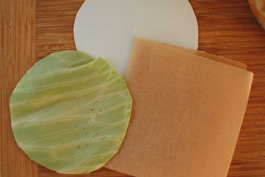 Tear cabbage leaf to size and place in jar. | MakeSauerkraut.com