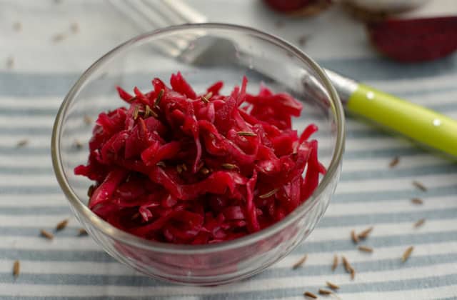 Top image of a bowl of Passion Pink sauerkraut. | MakeSauerkraut.com