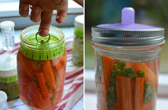 Two image side-by-side, a finger lifting a fermented jar of carrots by the hook n the lid of the Pickle Pusher fermentation weight at the left and a jar of fermented carrots using Pickle Pipes as a waterless airlock valve to the right. | MakeSauerkraut.com