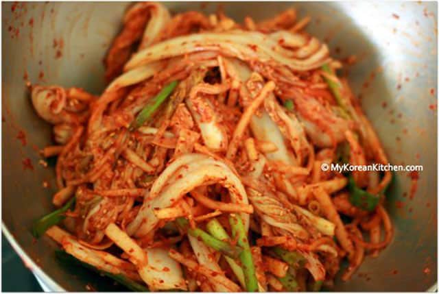 A bowl filed with Fresh Napa Cabbage Kimchi Salad (Baechu Geotjeori). | MakeSauerkraut.com