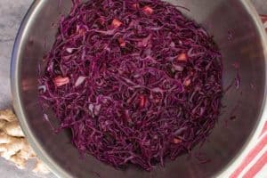 Ingredients for Ruby-Red Red-Cabbage Sauerkraut salted and mixed. | makesauerkraut.com
