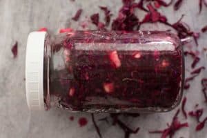 Packed jar of Ruby-Red Red-Cabbage Sauerkraut ready to ferment. | makesauerkraut.com