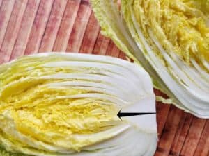 Making traditional square-cut kimchi (Mak Kimchi). Napa cabbage cut in half. | Makesauerkraut.com