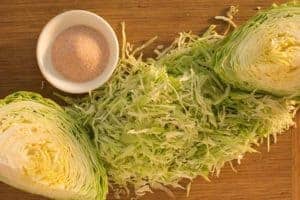 Sliced cabbage and salt. | MakeSauerkraut.com