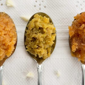 Three spoons of fermented pastes: garlic, garlic-ginger-onion, and honey garlic. | MakeSauerkraut.com