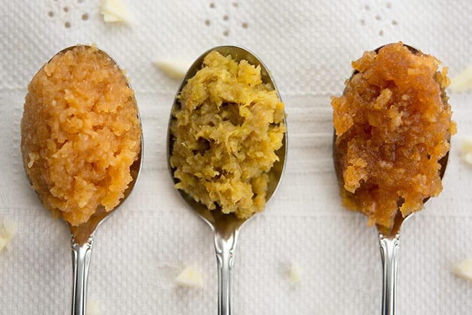 Three spoons of fermented pastes: garlic, garlic-ginger-onion, and honey garlic. | MakeSauerkraut.com