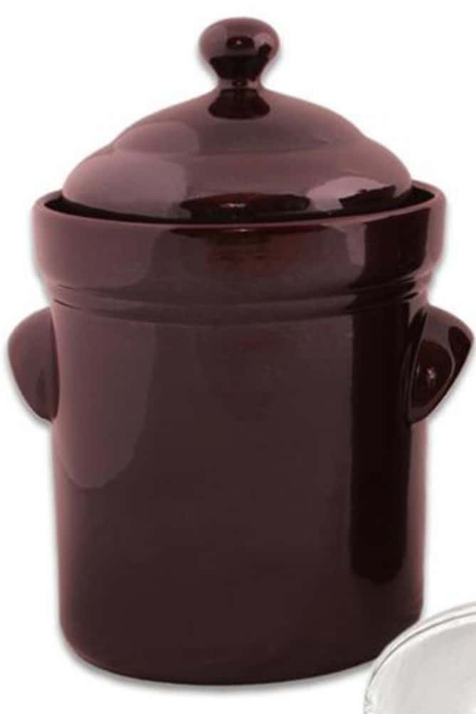 Dark brown fermentation crock with lid, handles and glass weight. | MakeSauerkraut.com