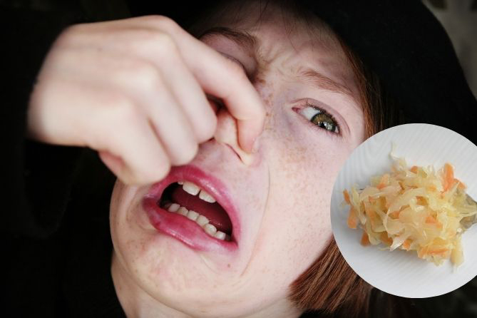 Woman with plugged nose next to serving of sauerkraut. | MakeSauerkraut.com