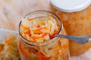 One unopened jar of sauerkraut and another opened jar of sauerkraut | MakeSauerkraut.com