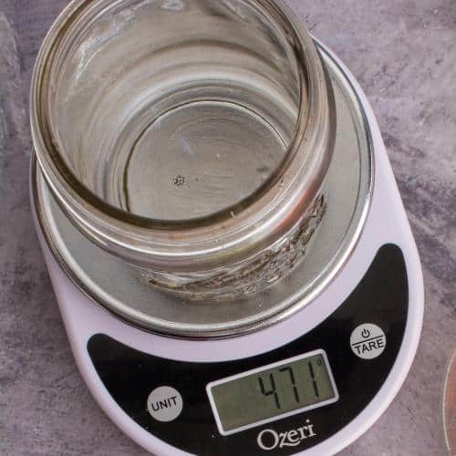 Empty jar on scale for tare weight. | MakeSauerkraut.com