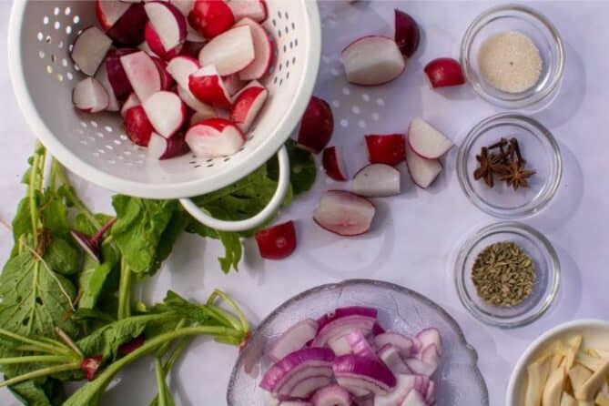 Chopped radishes and seasonings ready to ferment. | MakeSauerkraut.com