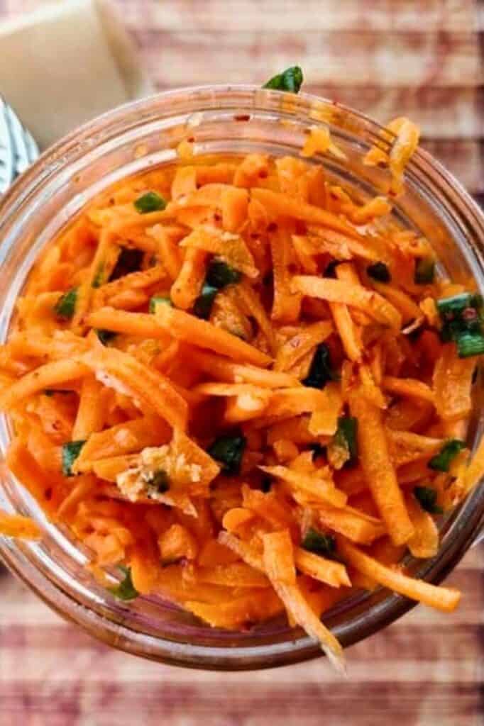 Bowl of carrot Kimchi [Tanggun] ready for fermentation. | MakeSauerkraut.com