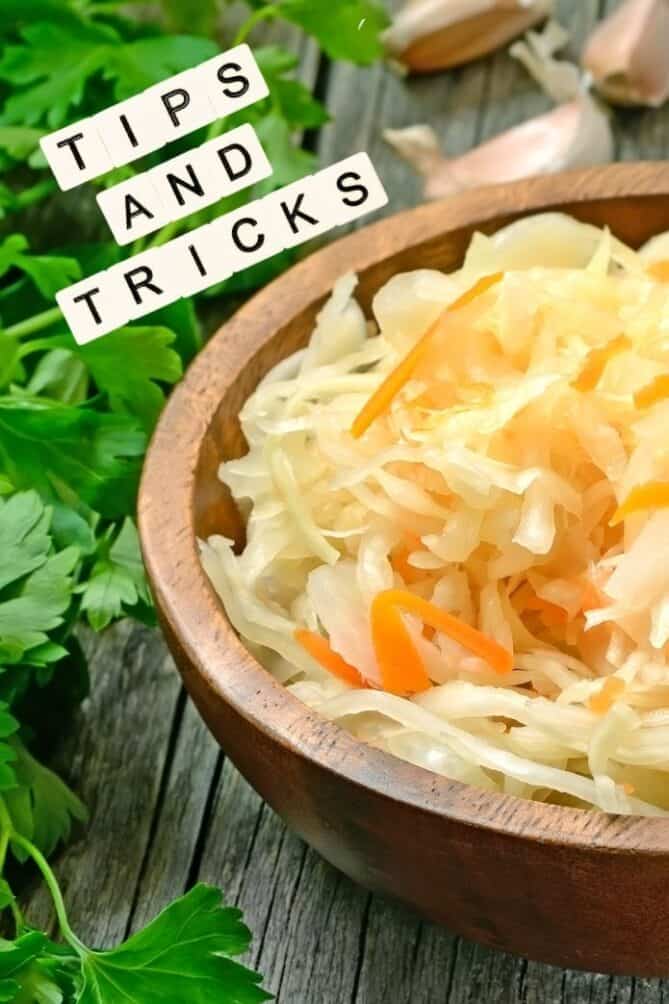 A wooden bowl of sauerkraut. | makesauerkraut.com