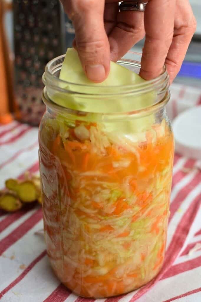 Jar of ginger carrot sauerkraut. | makesauerkraut.com