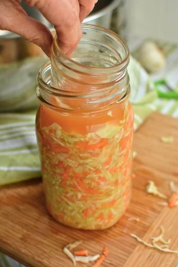 Jar of Sweet Garlic Sauerkraut with carrots. | makesauerkraut.com