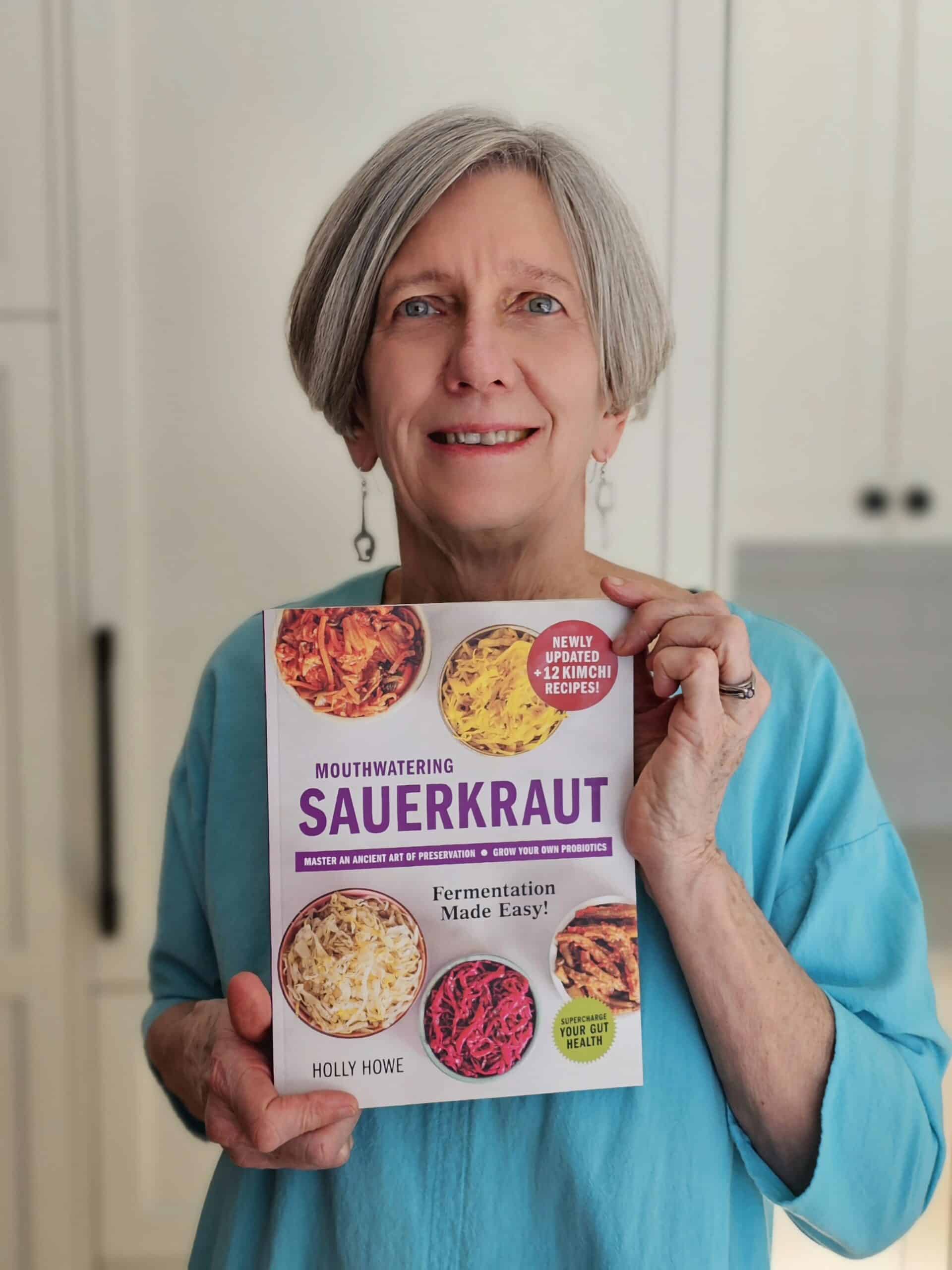 Holly Howe mouthwatering sauerkraut book Holly Howe holding her new book. | MakeSauerkraut.com